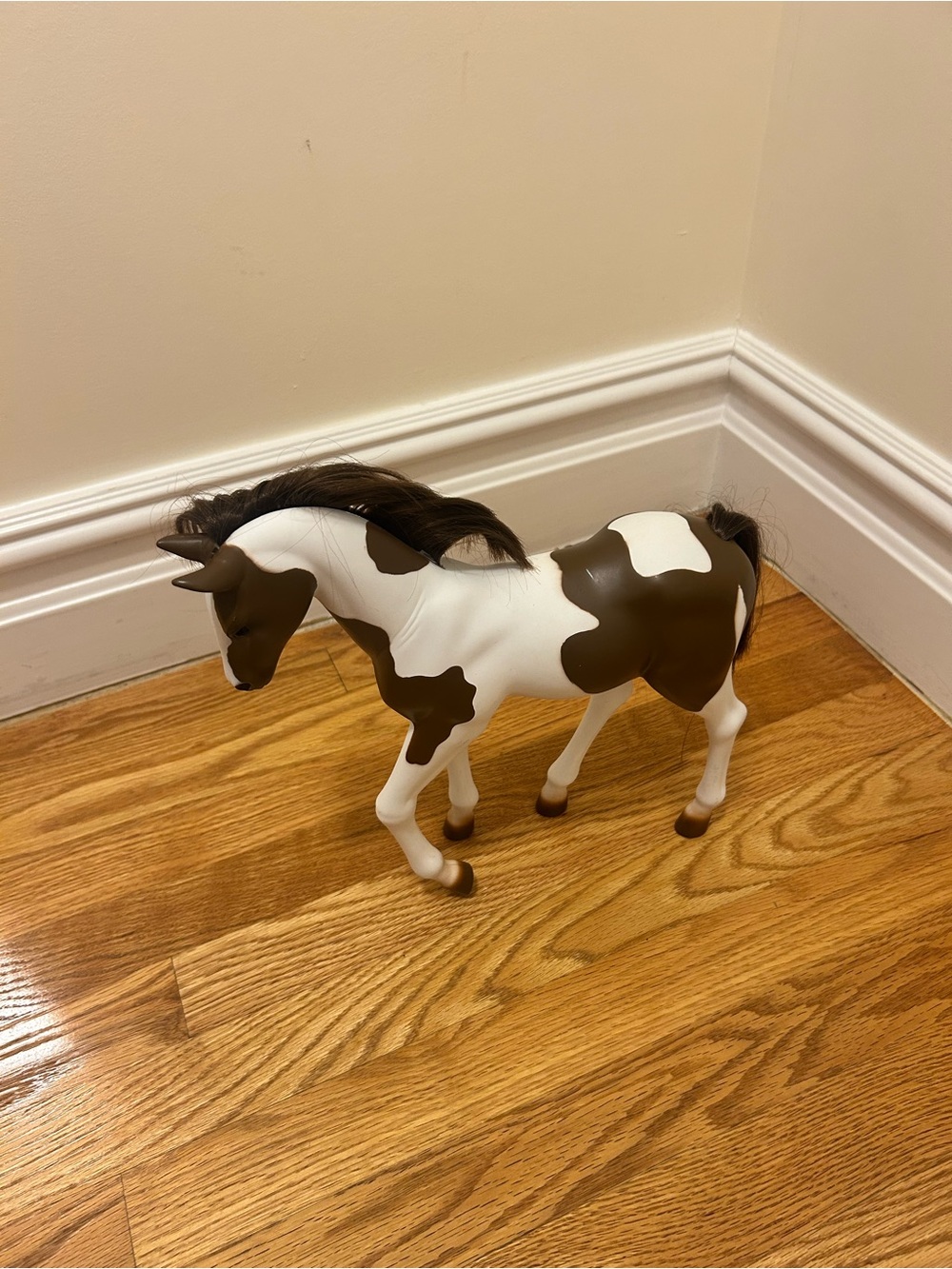 Brown and White Toy Horse Figurine -